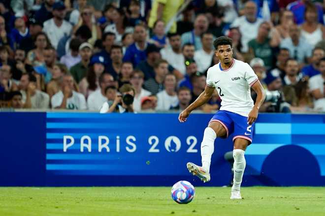 MARSEILLE, FRANCE - JULY 24: Nathan Harriel #2 of the United States passes the ball during the Men&amp;apos;s group A match between France and the United States during the Olympic Games Paris 2024 at Stade de Marseille on July 24, 2024 in Marseille, France. (Photo by Daniela Porcelli/ISI Photos/Getty Images)
