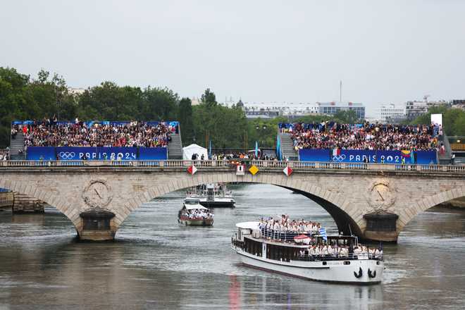 PARIS,&#x20;FRANCE&#x20;-&#x20;JULY&#x20;26&#x3A;&#x20;Team&#x20;Greece&#x20;are&#x20;seen&#x20;on&#x20;a&#x20;boat&#x20;on&#x20;the&#x20;Seine&#x20;during&#x20;the&#x20;opening&#x20;ceremony&#x20;of&#x20;the&#x20;Olympic&#x20;Games&#x20;Paris&#x20;2024&#x20;on&#x20;July&#x20;26,&#x20;2024&#x20;in&#x20;Paris,&#x20;France.&#x20;&#x28;Photo&#x20;by&#x20;Maddie&#x20;Meyer&#x2F;Getty&#x20;Images&#x29;