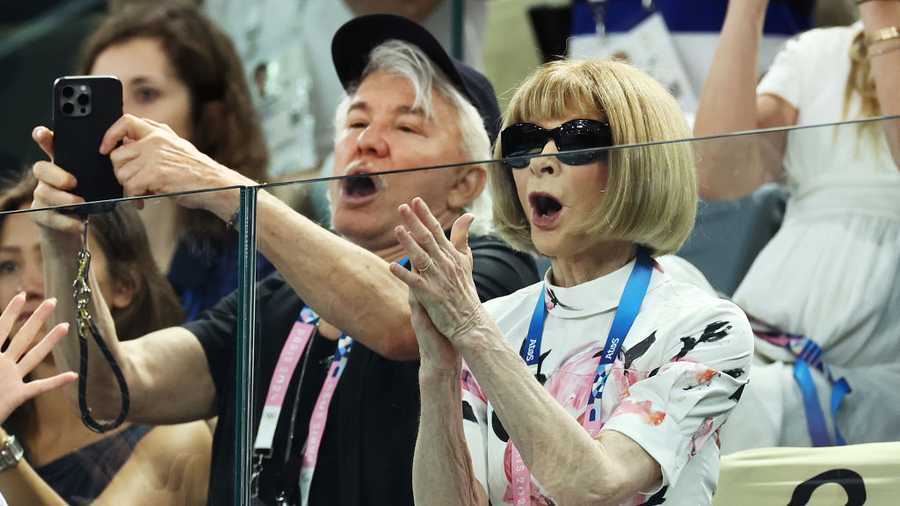 PARIS, FRANCE - JULY 28: Anna Wintour and Baz Luhrmann attend the Artistic Gymnastics Women's Qualification on day two of the Olympic Games Paris 2024 at Bercy Arena on July 28, 2024 in Paris, France. (Photo by Arturo Holmes/Getty Images)