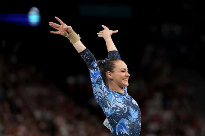 PARIS,&#x20;FRANCE&#x20;-&#x20;JULY&#x20;28&#x3A;&#x20;Shallon&#x20;Olsen&#x20;of&#x20;Team&#x20;Canada&#x20;celebrates&#x20;after&#x20;her&#x20;routine&#x20;on&#x20;the&#x20;vault&#x20;during&#x20;the&#x20;Artistic&#x20;Gymnastics&#x20;Women&amp;apos&#x3B;s&#x20;Qualification&#x20;on&#x20;day&#x20;two&#x20;of&#x20;the&#x20;Olympic&#x20;Games&#x20;Paris&#x20;2024&#x20;at&#x20;Bercy&#x20;Arena&#x20;on&#x20;July&#x20;28,&#x20;2024&#x20;in&#x20;Paris,&#x20;France.&#x20;&#x28;Photo&#x20;by&#x20;Ezra&#x20;Shaw&#x2F;Getty&#x20;Images&#x29;