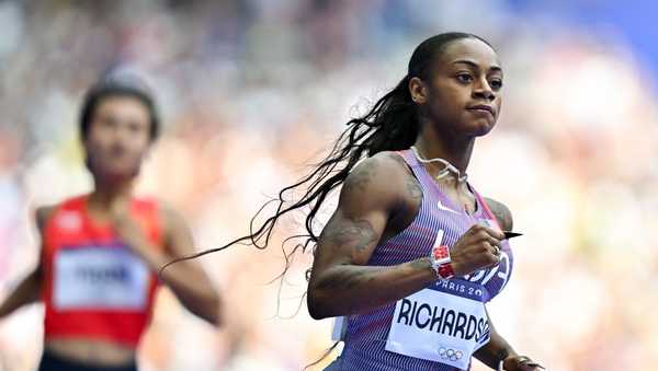 Sha'Carri Richardson of Team United States after winning her women's 100m round 1 heat at the Stade de France during the 2024 Paris Summer Olympic Games in Paris, France.
