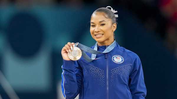 Jordan Chiles of USA celebrates during the Women's Artistic Gymnastics Floor Exercise Final medal ceremony on Day 10 of the Olympic Games Paris 2024 at Bercy Arena on August 5, 2024 in Paris, France. (Photo by Alex Gottschalk/DeFodi Images via Getty Images)