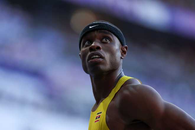 PARIS,&#x20;FRANCE&#x20;-&#x20;AUGUST&#x20;05&#x3A;&#x20;&#x20;Tarsis&#x20;Gracious&#x20;Orogot&#x20;of&#x20;Team&#x20;Uganda&#x20;looks&#x20;on&#x20;during&#x20;the&#x20;during&#x20;the&#x20;Men&amp;apos&#x3B;s&#x20;200m&#x20;Round&#x20;1&#x20;on&#x20;day&#x20;ten&#x20;of&#x20;the&#x20;Olympic&#x20;Games&#x20;Paris&#x20;2024&#x20;at&#x20;Stade&#x20;de&#x20;France&#x20;on&#x20;August&#x20;05,&#x20;2024&#x20;in&#x20;Paris,&#x20;France.&#x20;&#x28;Photo&#x20;by&#x20;Christian&#x20;Petersen&#x2F;Getty&#x20;Images&#x29;