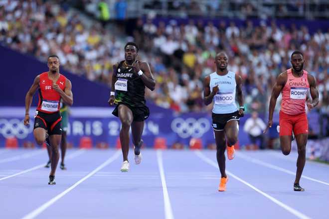 PARIS,&#x20;FRANCE&#x20;-&#x20;AUGUST&#x20;05&#x3A;&#x20;&#x20;Makanakaishe&#x20;Charamba&#x20;of&#x20;Team&#x20;Zimbabwe&#x20;competes&#x20;during&#x20;the&#x20;during&#x20;the&#x20;Men&amp;apos&#x3B;s&#x20;200m&#x20;Round&#x20;1&#x20;on&#x20;day&#x20;ten&#x20;of&#x20;the&#x20;Olympic&#x20;Games&#x20;Paris&#x20;2024&#x20;at&#x20;Stade&#x20;de&#x20;France&#x20;on&#x20;August&#x20;05,&#x20;2024&#x20;in&#x20;Paris,&#x20;France.&#x20;&#x28;Photo&#x20;by&#x20;Christian&#x20;Petersen&#x2F;Getty&#x20;Images&#x29;