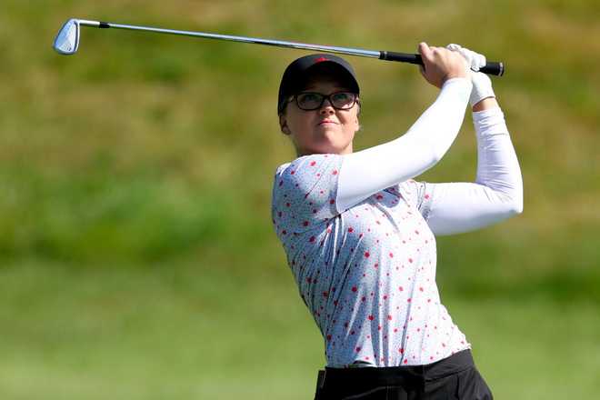 PARIS, FRANCE - AUGUST 06: Brooke M. Henderson of Team Canada looks on after playing her second shot on the 13th hole during a practice round ahead of the Women&amp;apos;s Individual Stroke Play on day eleven of the Olympic Games Paris 2024 at Le Golf National on August 06, 2024 in Paris, France. (Photo by Andrew Redington/Getty Images)