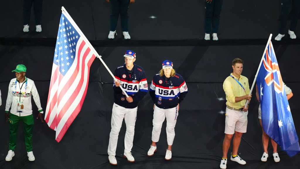 Watch Katie Ledecky, Nick Mead carry U.S. flag into Paris Closing Ceremony