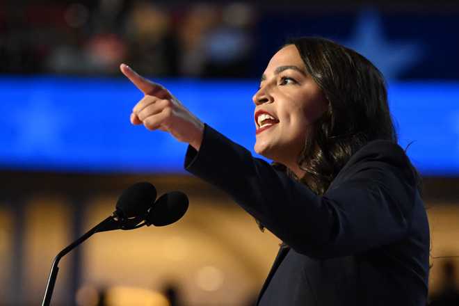 US Representative Alexandria Ocasio-Cortez (D-NY) speaks on the first day of the Democratic National Convention (DNC) at the United Center in Chicago, Illinois, on August 19, 2024. Vice President Kamala Harris will formally accept the party&apos;s nomination for president at the DNC which runs from August 19-22 in Chicago. (Photo by ANDREW CABALLERO-REYNOLDS / AFP) (Photo by ANDREW CABALLERO-REYNOLDS/AFP via Getty Images)