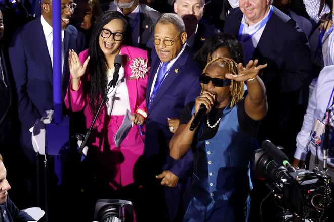 CHICAGO, ILLINOIS - AUGUST 20: Rapper Lil Jon (R) performs with the Georgia delegation during the Ceremonial Roll Call of States on the second day of the Democratic National Convention at the United Center on August 20, 2024 in Chicago, Illinois. Delegates, politicians, and Democratic Party supporters are gathering in Chicago, as current Vice President Kamala Harris is named her party&apos;s presidential nominee. The DNC takes place from August 19-22. (Photo by Chip Somodevilla/Getty Images)