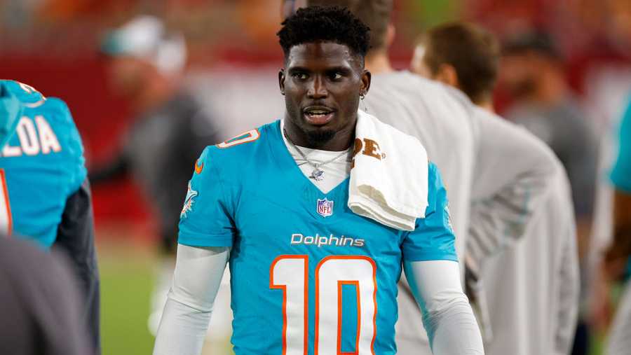 Tyreek Hill is detained by police before Dolphins game; 1 officer is  subsequently placed on leave