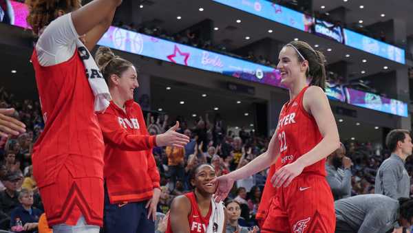 CHICAGO, IL - AUGUST 30: Caitlin Clark #22 of the Indiana Fever greets the bench as she walks to the bench during the second half of a WNBA game against the Chicago Sky on August 30, 2024 at Wintrust Arena in Chicago, Illinois. (Photo by Melissa Tamez/Icon Sportswire via Getty Images)