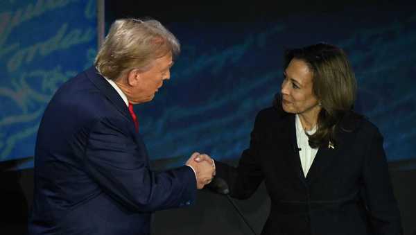 US Vice President and Democratic presidential candidate Kamala Harris and former US President and Republican presidential candidate Donald Trump shake hands at the start of a presidential debate at the National Constitution Center in Philadelphia, Pennsylvania, on September 10, 2024. (Photo by SAUL LOEB / AFP) (Photo by SAUL LOEB/AFP via Getty Images)