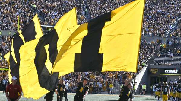 IOWA CITY, IA - SEPTEMBER 07: Iowa cheerleaders lead the team onto the field before the second half during a college football game between the Iowa State Cyclones and the Iowa Hawkeyes, on September 07, 2024, at Kinnick Stadium, Iowa City, IA. (Photo by Keith Gillett/IconSportswire)