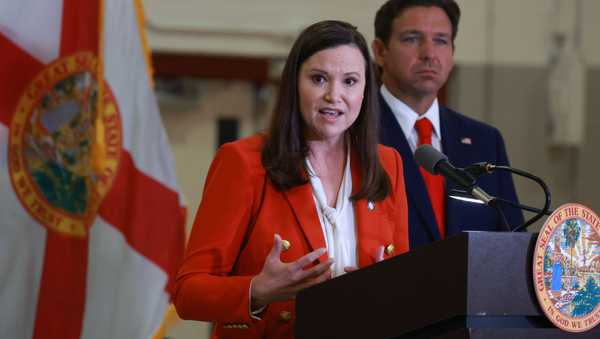 WEST PALM BEACH, FLORIDA - SEPTEMBER 17: Florida Gov. Ron DeSantis listens as Florida Attorney General Ashley Moody speaks during a press conference regarding an apparent assassination attempt of former President Donald Trump on September 17, 2024 in West Palm Beach, Florida. The Governor announced that the State of Florida's law enforcement will do their own investigation into the incident, which the FBI said "appears to be an attempted assassination of former President Trump' while he was golfing at Trump International Golf Club.  (Photo by Joe Raedle/Getty Images)