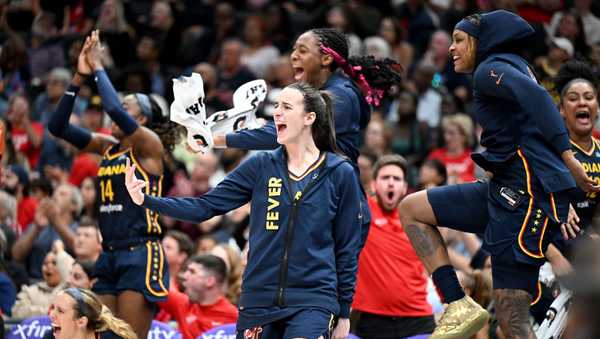 WASHINGTON, DC - SEPTEMBER 19: Caitlin Clark #22 of the Indiana Fever reacts to a play in the fourth quarter against the Washington Mystics at Capital One Arena on September 19, 2024 in Washington, DC.  NOTE TO USER: User expressly acknowledges and agrees that, by downloading and or using this photograph, User is consenting to the terms and conditions of the Getty Images License Agreement. (Photo by Greg Fiume/Getty Images)