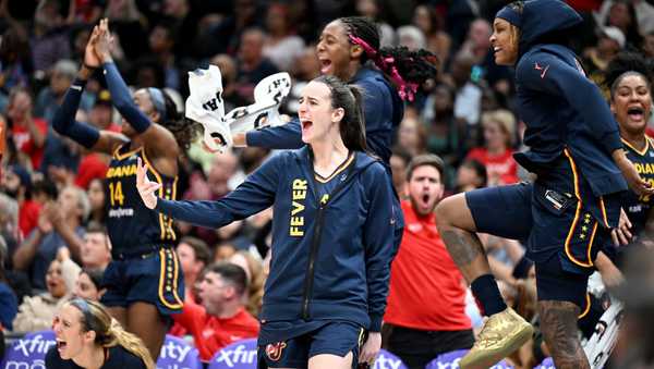 WASHINGTON, DC - SEPTEMBER 19: Caitlin Clark #22 of the Indiana Fever reacts to a play in the fourth quarter against the Washington Mystics at Capital One Arena on September 19, 2024 in Washington, DC.  NOTE TO USER: User expressly acknowledges and agrees that, by downloading and or using this photograph, User is consenting to the terms and conditions of the Getty Images License Agreement. (Photo by Greg Fiume/Getty Images)