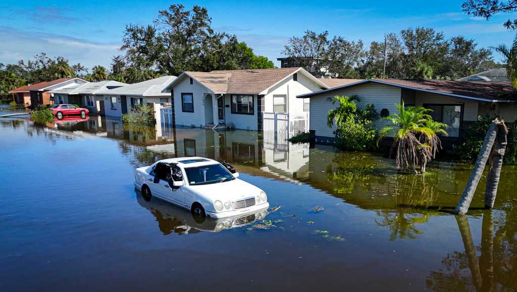 Floridians return home to clean up from two hurricanes with gas and