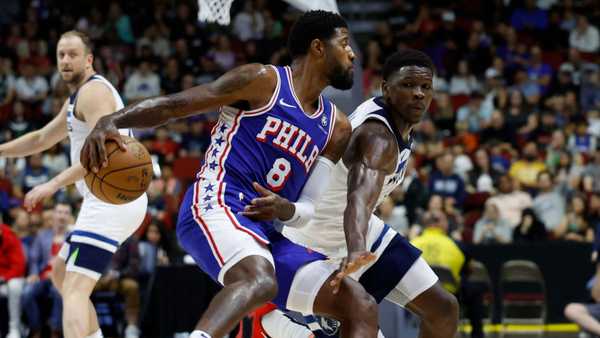 DES MOINES, IOWA - OCTOBER 11: Paul George #8 of the Philadelphia 76ers drives the ball as Anthony Edwards #5 of the Minnesota Timberwolves puts pressure on him in the first half of play during a preseason game at Wells Fargo Arena on October 11, 2024, in Des Moines, Iowa. NOTE TO USER: User expressly acknowledges and agrees that, by downloading and or using this photograph, User is consenting to the terms and conditions of the Getty Images License Agreement (Photo by David Purdy/Getty Images)