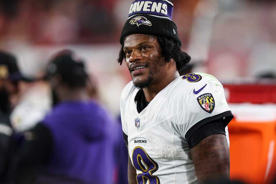 TAMPA, FLORIDA - OCTOBER 21: Lamar Jackson #8 of the Baltimore Ravens looks on from the sideline during an NFL football game against the Tampa Bay Buccaneers at Raymond James Stadium on October 21, 2024 in Tampa, Florida. (Photo by Perry Knotts/Getty Images)