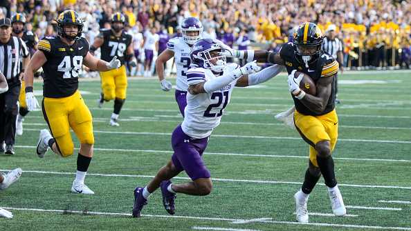 IOWA CITY, IOWA- OCTOBER 26:  Running back Kaleb Johnson #2 of the Iowa Hawkeyes runs up the field  on a touchdown run during the first half in front defensive back Damon Walters #21 of the Northwestern Wildcats at Kinnick Stadium on October 26, 2024 in Iowa City, Iowa.  (Photo by Matthew Holst/Getty Images)