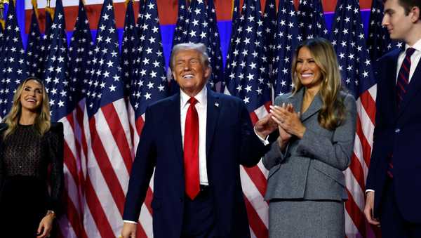 WEST PALM BEACH, FLORIDA - NOVEMBER 06:  Republican presidential nominee, former U.S. President Donald Trump reacts on stage with former first lady Melania Trump during an election night event at the Palm Beach Convention Center on November 06, 2024 in West Palm Beach, Florida. Americans cast their ballots today in the presidential race between Republican nominee former President Donald Trump and Vice President Kamala Harris, as well as multiple state elections that will determine the balance of power in Congress.   (Photo by Chip Somodevilla/Getty Images)