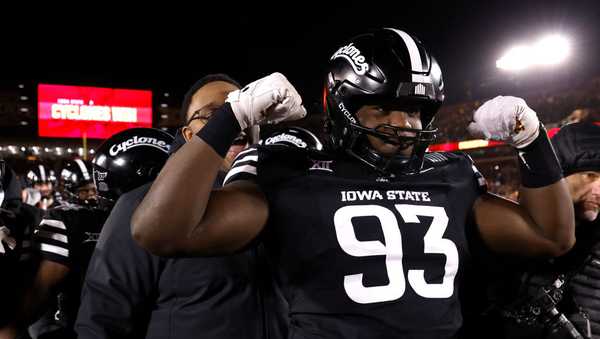 AMES, IA - NOVEMBER 30: Defensive lineman Obald Niyonkuru #93 of the Iowa State Cyclones reacts after the Iowa State Cyclones win 29-21 over the Kansas State Wildcats at Jack Trice Stadium on November 30, 2024, in Ames, Iowa. The Iowa State Cyclones won 29-21 over the Kansas State Wildcats. (Photo by David Purdy/Getty Images)