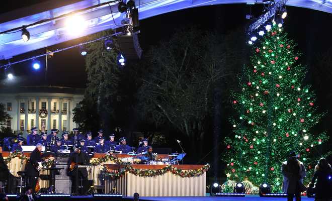 WASHINGTON, DC - DECEMBER 05:  The National Christmas Tree stands after being lit by U.S. President Joe Biden during the 102nd National Christmas Tree Lighting Ceremony on the Ellipse on December 05, 2024 in Washington, DC. The 2024 National Christmas Tree is a 35-foot Red Spruce from the George Washington and Jefferson National Forests in Virginia. (Photo by Kevin Dietsch/Getty Images)