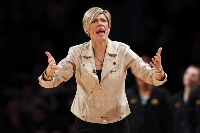 NEW YORK, NEW YORK - DECEMBER 07: Head coach Jan Jensen of the Iowa Hawkeyes reacts during the first half against the Tennessee Lady Vols at the Shark Beauty Women's Champions Classic at Barclays Center on December 07, 2024 in the Brooklyn borough of New York City. (Photo by Sarah Stier/Getty Images)