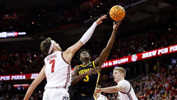 MADISON, WISCONSIN - JANUARY 03: Drew Thelwell #3 of the Iowa Hawkeyes goes up for a shot in the first half in the game against the Wisconsin Badgers at Kohl Center on January 03, 2025 in Madison, Wisconsin. (Photo by John Fisher/Getty Images)