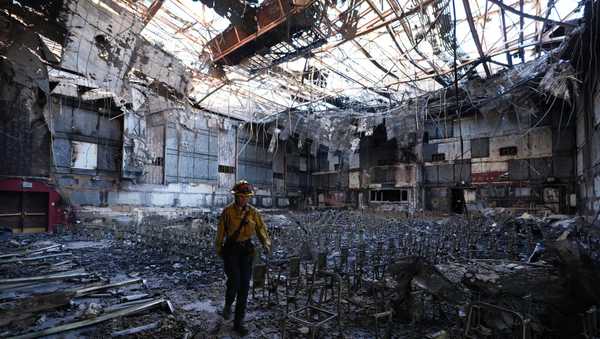 A view of burnt down auditorium of the Eliot Arts Magnet academy and supermarkets in Altadena, Los Angeles, California, United States on January 12, 2025.