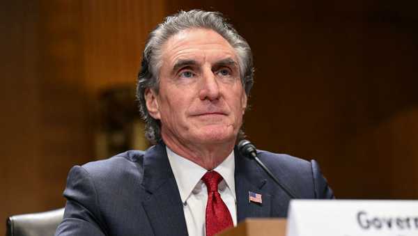 Former North Dakota Governor Doug Burgum listens during a Senate Energy and Natural Resources Committee hearing on his nomination to be Secretary of the Interior, on Capitol Hill in Washington, DC, on January 16, 2025. (Photo by SAUL LOEB / AFP) (Photo by SAUL LOEB/AFP via Getty Images)