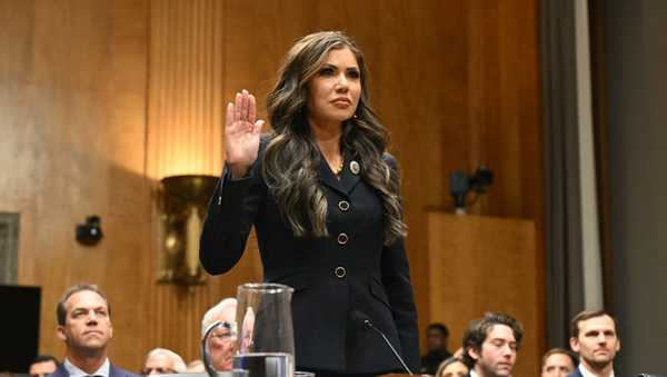 South Dakota Governor Kristi Noem is sworn in during a Senate Homeland Security and Governmental Affairs Committee hearing on her nomination to be Secretary of Homeland Security, on Capitol Hill in Washington, DC, on January 17, 2025.