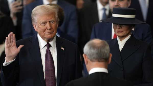 WASHINGTON, DC - JANUARY 20:  Donald Trump is sworn into office by Supreme Court Chief Justice John Roberts as Melania Trump holds the Bible  in the U.S. Capitol Rotunda on January 20, 2025 in Washington, DC. Donald Trump takes office for his second term as the 47th president of the United States. (Photo by Julia Demaree Nikhinson - Pool/Getty Images)