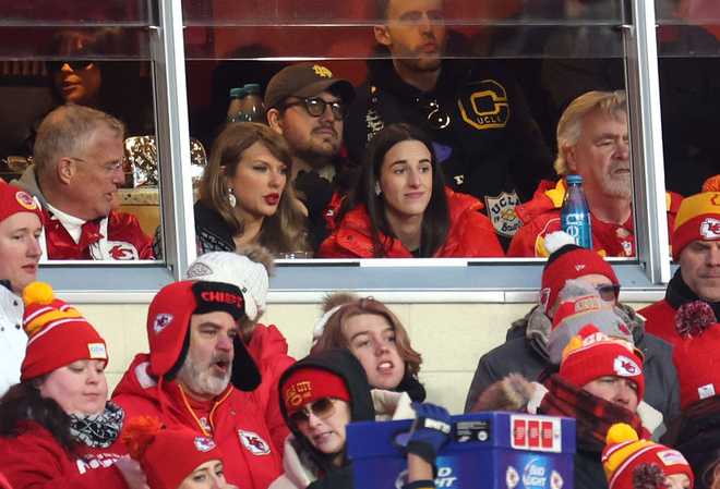 KANSAS&#x20;CITY,&#x20;MISSOURI&#x20;-&#x20;JANUARY&#x20;18&#x3A;&#x20;Singer-songwriter&#x20;Taylor&#x20;Swift&#x20;&#x28;L&#x29;&#x20;talks&#x20;with&#x20;Caitlin&#x20;Clark&#x20;&#x28;R&#x29;&#x20;of&#x20;the&#x20;Indiana&#x20;Fever&#x20;during&#x20;the&#x20;second&#x20;half&#x20;in&#x20;the&#x20;AFC&#x20;Divisional&#x20;Playoff&#x20;between&#x20;the&#x20;Houston&#x20;Texans&#x20;and&#x20;the&#x20;Kansas&#x20;City&#x20;Chiefs&#x20;at&#x20;GEHA&#x20;Field&#x20;at&#x20;Arrowhead&#x20;Stadium&#x20;on&#x20;January&#x20;18,&#x20;2025&#x20;in&#x20;Kansas&#x20;City,&#x20;Missouri.&#x20;&#x28;Photo&#x20;by&#x20;Jamie&#x20;Squire&#x2F;Getty&#x20;Images&#x29;
