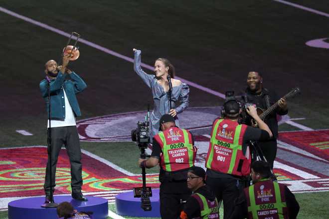 NEW ORLEANS, LOUISIANA - FEBRUARY 09: (L-R) Trombone Shorty and Lauren Daigle perform onstage prior to Super Bowl LIX at Caesars Superdome on February 09, 2025 in New Orleans, Louisiana.  (Photo by Cindy Ord/Getty Images)