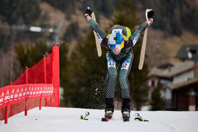 BORMIO, ITALY - FEBRUARY 23: Paul Verbnjak of Austria takes skins off his skis during the ISMF Ski Mountaineering World Cup Team Relay event at Stelvio Alpine Skiing Centre on February 23, 2025 in Bormio, Italy. (Photo by Francesco Scaccianoce/Getty Images)