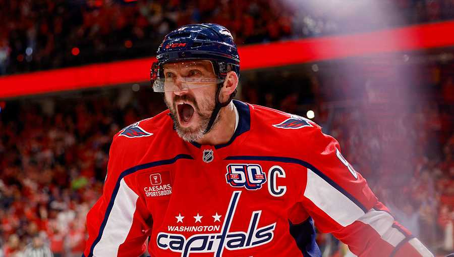 WASHINGTON, DC - APRIL 4: Alex Ovechkin #8 of the Washington Capitals celebrates a first period goal bringing his career NHL goals total to 893 goals, just one behind the total of 894 goals set by Wayne Gretzky during a game against the Chicago Blackhawks at Capital One Arena on April 4, 2022 in Washington, D.C. (Photo by John McCreary/NHLI via Getty Images)