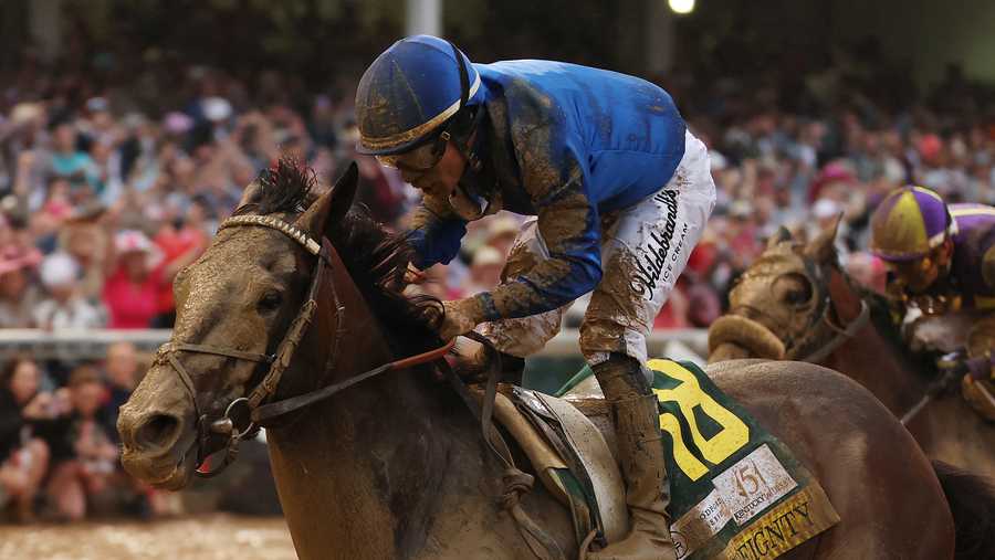 LOUISVILLE, KENTUCKY - MAY 03: Sovereignty #18, ridden by jockey Junior Alvarado crosses the finish line to win the 151st running of the Kentucky Derby at Churchill Downs on May 03, 2025 in Louisville, Kentucky. (Photo by Michael Reaves/Getty Images)