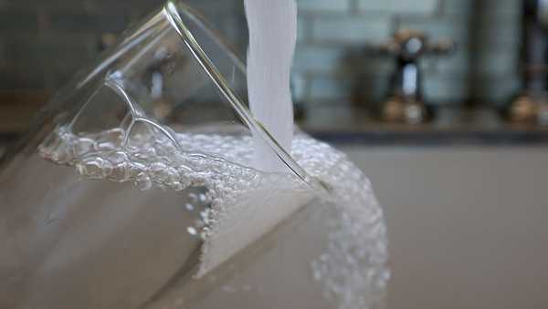 MIAMI, FLORIDA - MAY 16:  In this photo illustration, water runs from a kitchen faucet on May 16, 2025 in Miami, Florida. Florida Gov. Ron DeSantis signed a bill into law that will ultimately ban fluoride from the state's water system, going into effect on July 1. (Photo illustration by Joe Raedle/Getty Images)