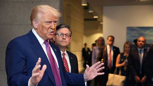 With Speaker of the House Mike Johnson (R-LA) by his side President Donald Trump speaks to the press following a House Republican meeting at the U.S. Capitol on May 20, 2025 in Washington, D.C.