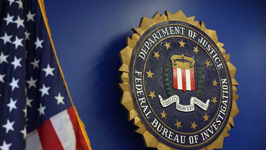 The logo of the Federal Bureau of Investigation (FBI) is seen at the Los Angeles Federal Building after a news conference to provide an update on the investigation into a May 18, 2025, bombing at a fertility clinic in Palm Springs, California, on June 4, 2025, in Los Angeles. Daniel Park, 32 from Washington state, was arrested by the FBI at John F. Kennedy International Airport on June 3, 2025, as he was arriving. He is a suspect in the investigation into the May 18, 2025, bombing at a fertility clinic in Palm Springs, California. (Photo by Patrick T. Fallon / AFP) (Photo by PATRICK T. FALLON/AFP via Getty Images)          