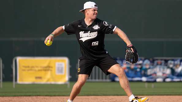 DES MOINES, IOWA - JUNE 01: Cooper DeJean of the Philadelphia Eagles makes a play during the Cooper DeJean All-Star Charity Softball Game at Principal Park on June 01, 2025 in Des Moines, Iowa. (Photo by Ginnie Coleman/Getty Images)