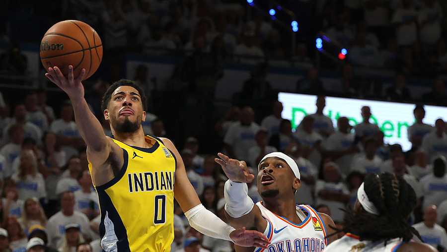 OKLAHOMA CITY, OKLAHOMA - JUNE 05:  Tyrese Haliburton #0 of the Indiana Pacers attempts a lay up past Shai Gilgeous-Alexander #2 of the Oklahoma City Thunder during the fourth quarter in Game One of the 2025 NBA Finals at Paycom Center on June 05, 2025 in Oklahoma City, Oklahoma. NOTE TO USER: User expressly acknowledges and agrees that, by downloading and or using this photograph, User is consenting to the terms and conditions of the Getty Images License Agreement. (Photo by Matthew Stockman/Getty Images)