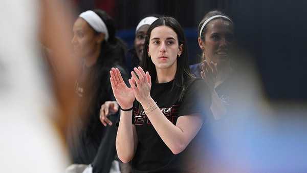 CHICAGO, ILLINOIS - JUNE 07: Caitlin Clark #22 of the Indiana Fever cheers from the bench against the Chicago Sky at the United Center on June 07, 2025 in Chicago, Illinois. NOTE TO USER: User expressly acknowledges and agrees that, by downloading and or using this photograph, user is consenting to the terms and conditions of the Getty Images License Agreement. (Photo by Daniel Bartel/Getty Images)