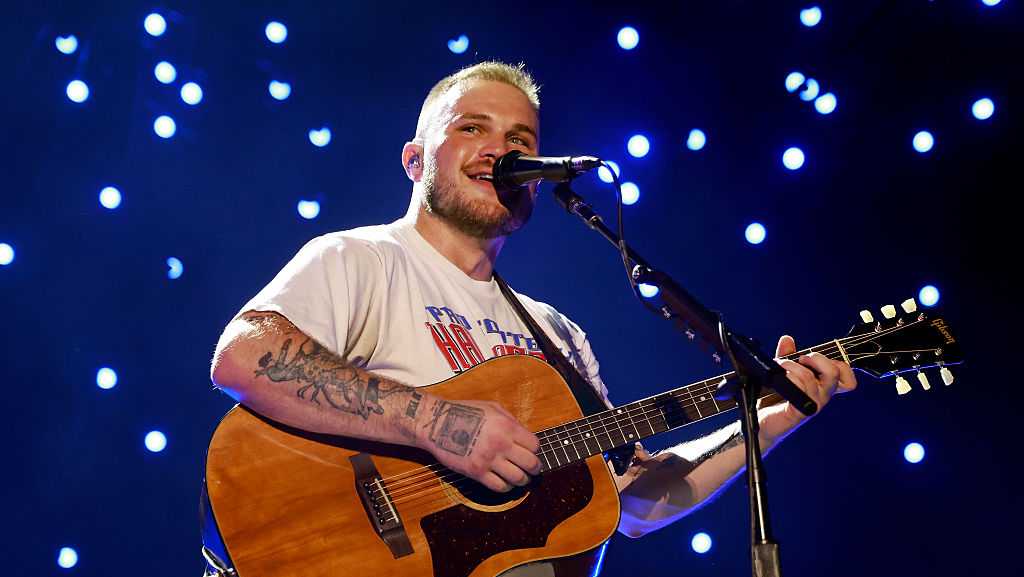 Zach Bryan performing at Nebraska's Memorial Stadium