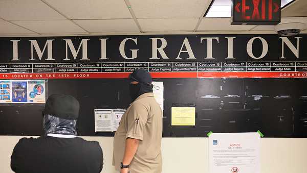 NEW YORK, NEW YORK - AUGUST 25: Federal agents patrol the halls of immigration court at the Jacob K. Javits Federal Building on August 25, 2025 in New York City. According to immigration data collected by the nonpartisan Transactional Records Access Clearinghouse (TRAC), the number of people held in immigration detention has risen by more than 50% since U.S. President Donald Trump took office in January, with 60,000 immigrants being held in long-term detention.  (Photo by Michael M. Santiago/Getty Images)