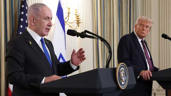 WASHINGTON, DC - SEPTEMBER 29: U.S. President Donald Trump (R) looks on as Israeli Prime Minister Benjamin Netanyahu delivers remarks during a joint news conference in the State Dining Room at the White House on September 29, 2025 in Washington, DC. President Trump welcomed Netanyahu for his fourth visit to the White House, where the two leaders met to discuss the latest U.S. backed plans to end the war in Gaza and secure the release of the remaining hostages held by Hamas. (Photo by Win McNamee/Getty Images)
