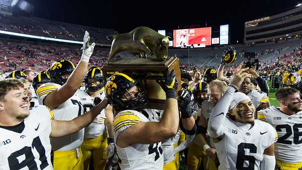 MADISON, WI - OCTOBER 11: The Iowa Hawkeyes celebrate with The Heartland Trophy after winning durning a college football game between the Iowa Hawkeyes and the Wisconsin Badgers on October 11, 2025 at Camp Randall Stadium in Madison, WI. (Photo by Dan Sanger/Icon Sportswire via Getty Images)