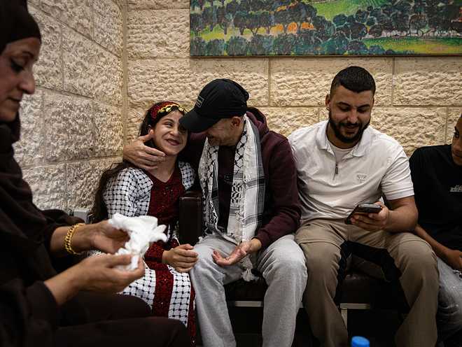 Moments&#x20;of&#x20;families&#x20;warmly&#x20;welcoming&#x20;released&#x20;Palestinian&#x20;prisoners&#x20;returning&#x20;from&#x20;Israeli&#x20;jails&#x20;on&#x20;October&#x20;13,&#x20;2025&#x20;in&#x20;Ramallah,&#x20;West&#x20;Bank.