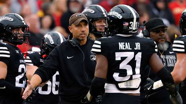 AMES, IA - OCTOBER 25: Head coach Matt Campbell of the Iowa State Cyclones celebrates on the sidelines with defensive back Marcus Neal #31 of the Iowa State Cyclones in the first half of play at Jack Trice Stadium on October 25, 2025, in Ames, Iowa. The BYU Cougars won 41-27 over the Iowa State Cyclones. (Photo by David K Purdy/Getty Images)