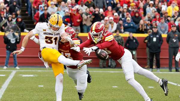 AMES, IOWA - NOVEMBER 1: Defensive back Caden Matson #43, and defensive back Carson van Dinter #36 of the Iowa State Cyclones block a punt by punter Kanyon Floyd #31 of the Arizona State Sun Devils in the first half of play at Jack Trice Stadium on November 1, 2025, in Ames, Iowa. (Photo by David Purdy/Getty Images)